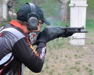 Shooter using earmuffs